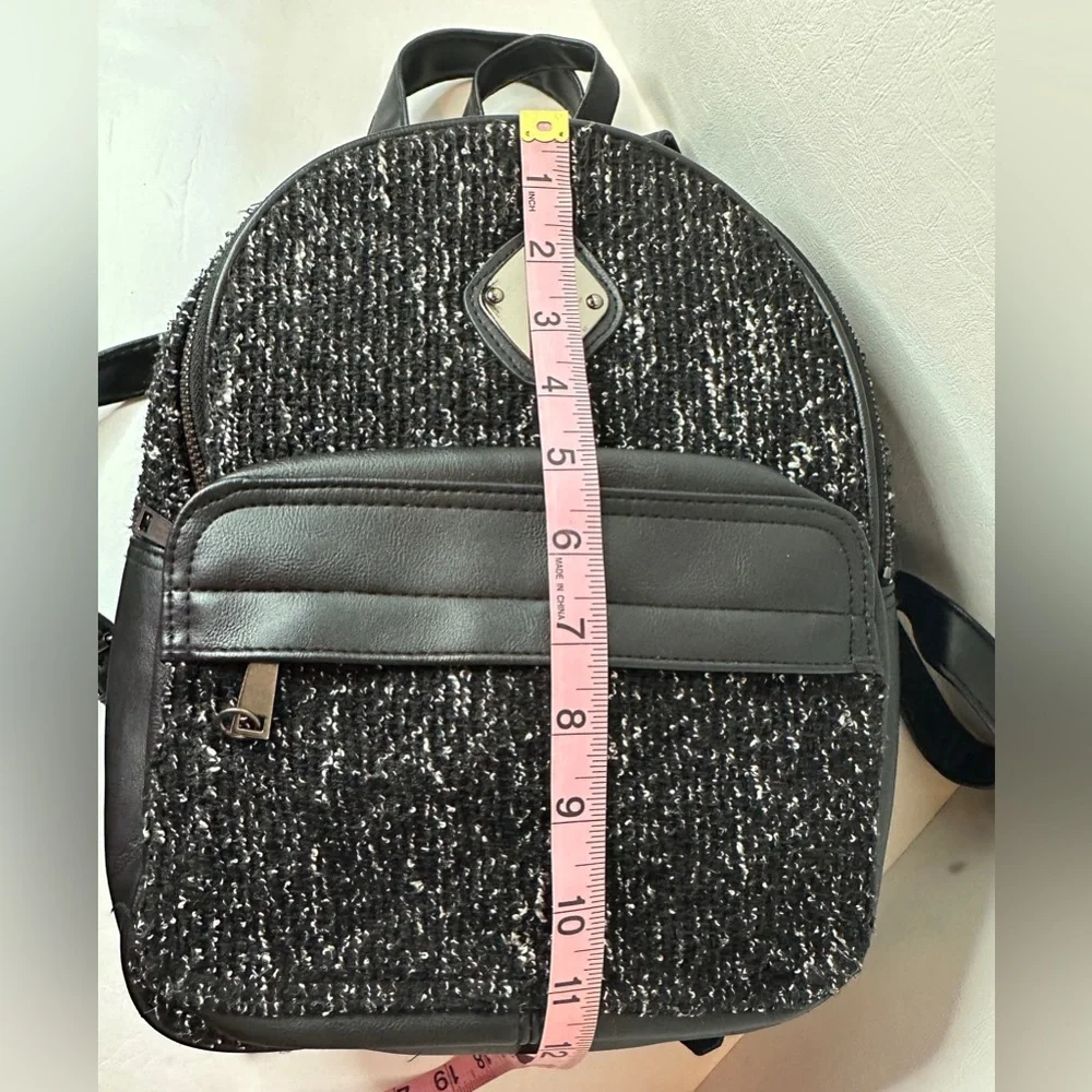 Claire’s Black Woven Faux Leather and Fabric Backpack With Silver Hardware